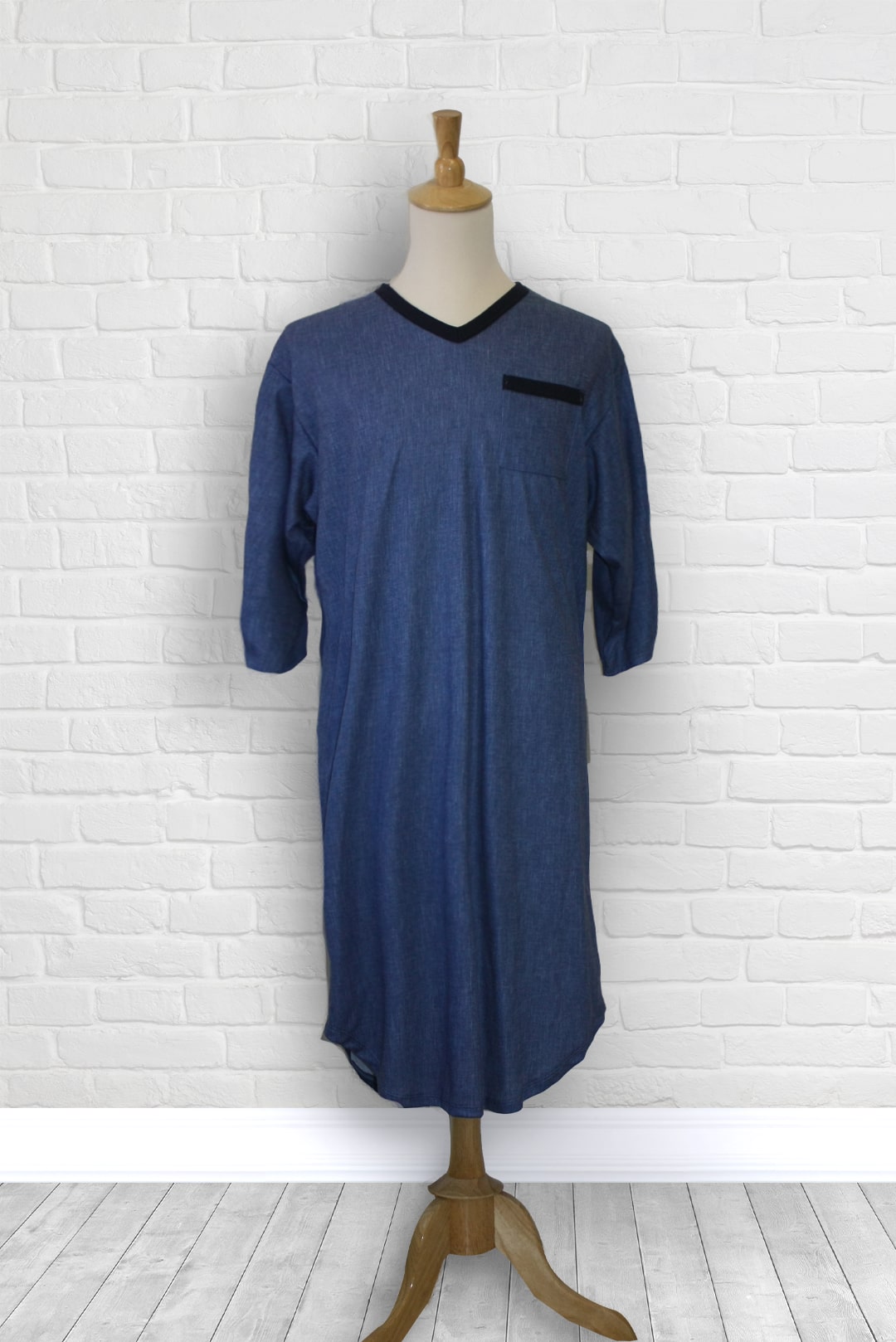 Adaptive nightshirt for men. Designed as a hospital gown, this soft knit is a blend of polyester and cotton. Double panels prevent the garment from opening at the back.