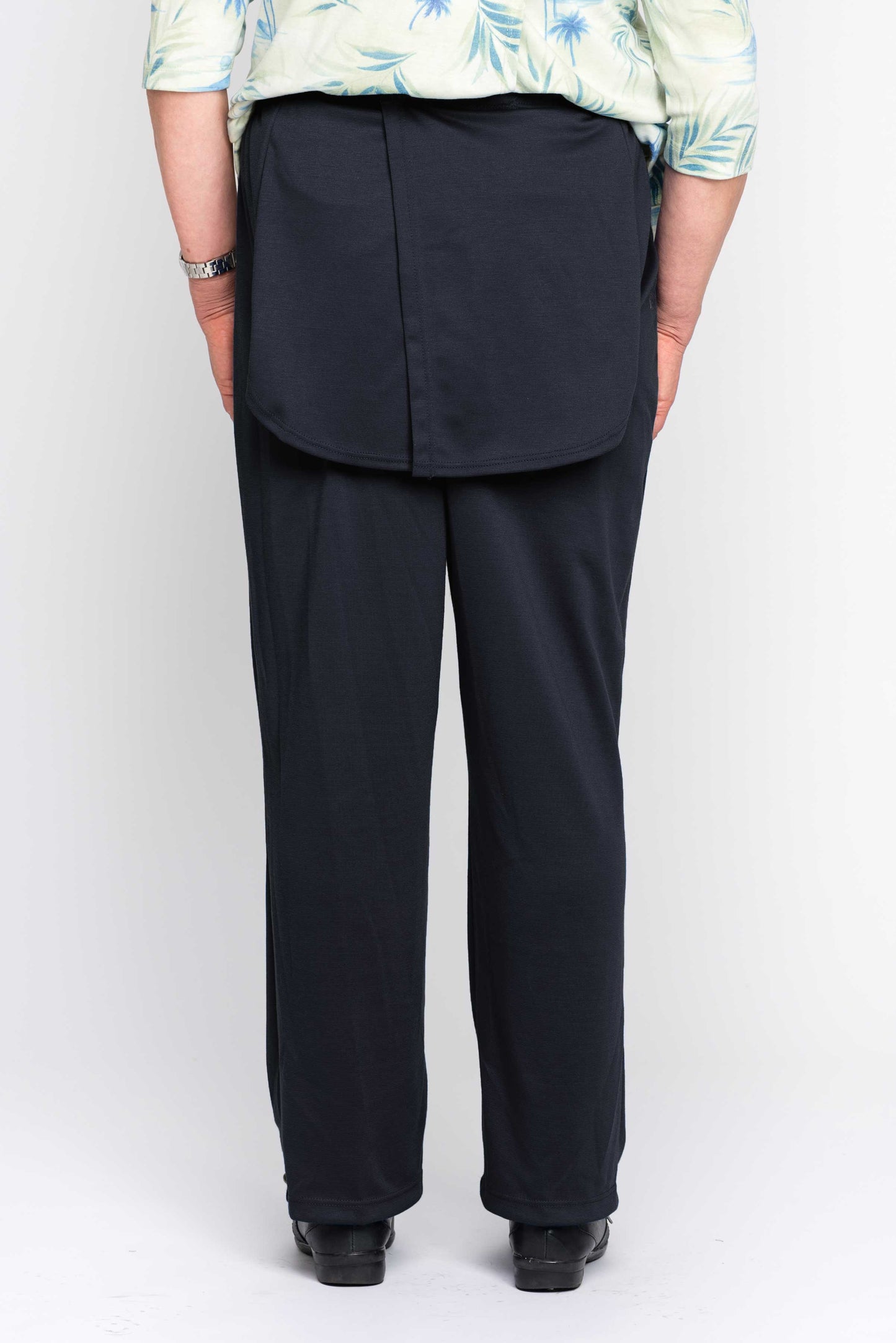 Stay comfortable and confident all day in our best-selling adaptive pants! These women's pants feature a convenient open back design and double panels to discreetly hide incontinence diapers. The soft, lightweight fabric is a blend of rayon and polyester,