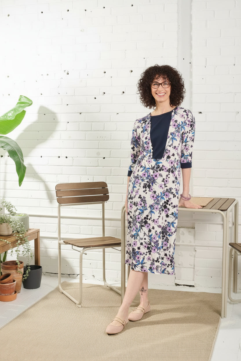 This adaptive dress is designed with 3/4 sleeves, a beautiful floral pattern, and an open back for easy dressing. Metal snaps ensure a secure fit, making it perfect for those with limited mobility. Stay stylish and comfortable with this versatile dress.