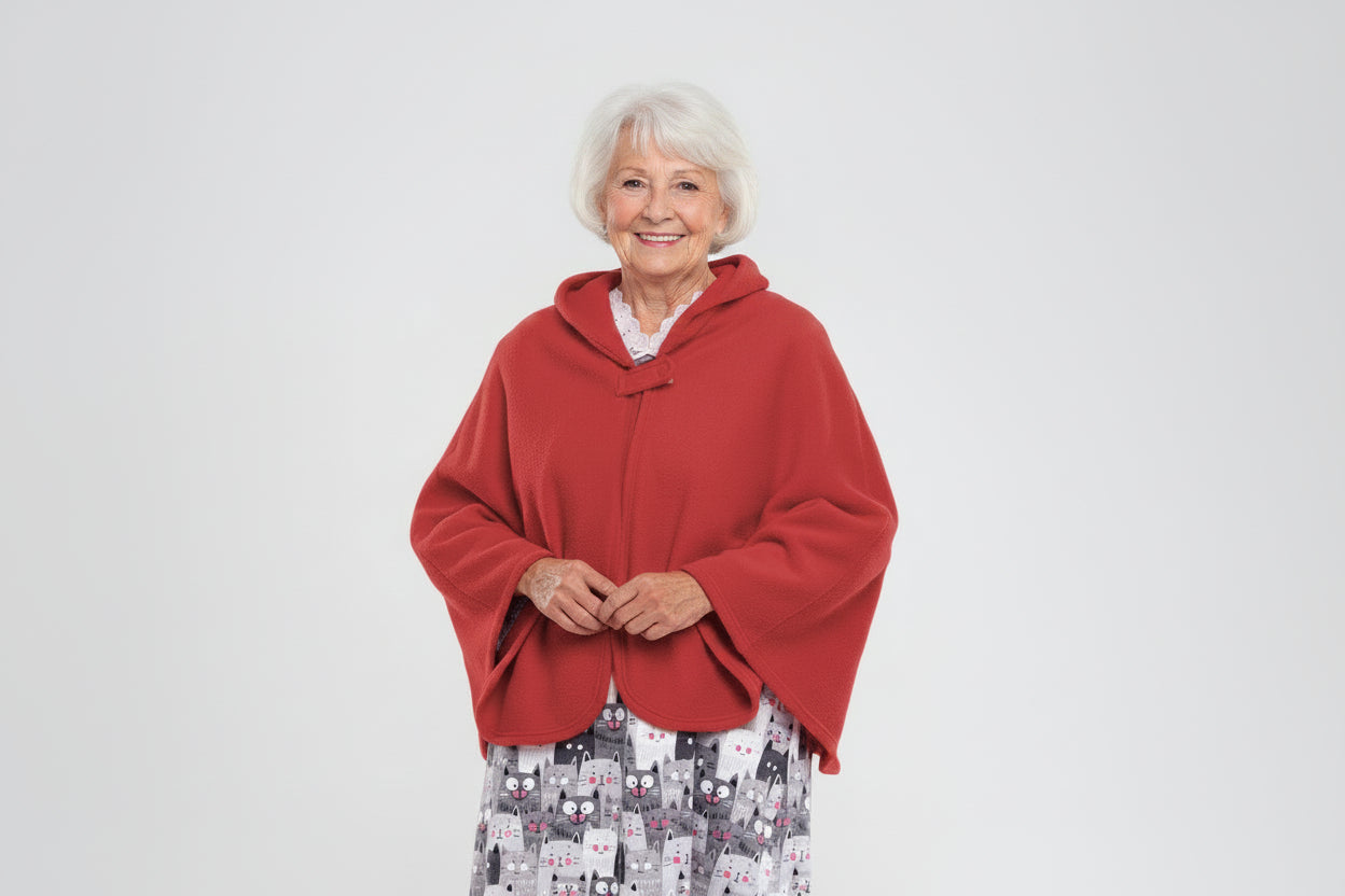 Stay warm and cozy with our Cape in Polar Fleece. This versatile bedcoat doubles as a cape, perfect for added warmth and style. Made with soft polar fleece, it's not only comfortable but also comforting. Available in pastel or classic colors for a touch o