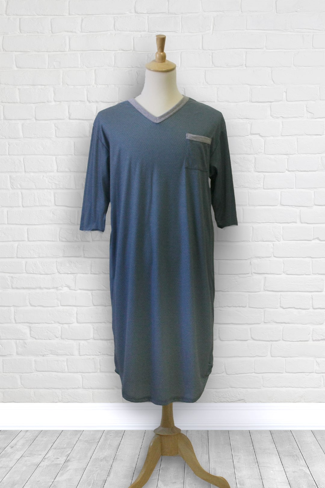 Adaptive nightshirt for men. Designed as a hospital gown, this soft knit is a blend of polyester and cotton.  Double panels prevent the garment from opening at the back. 