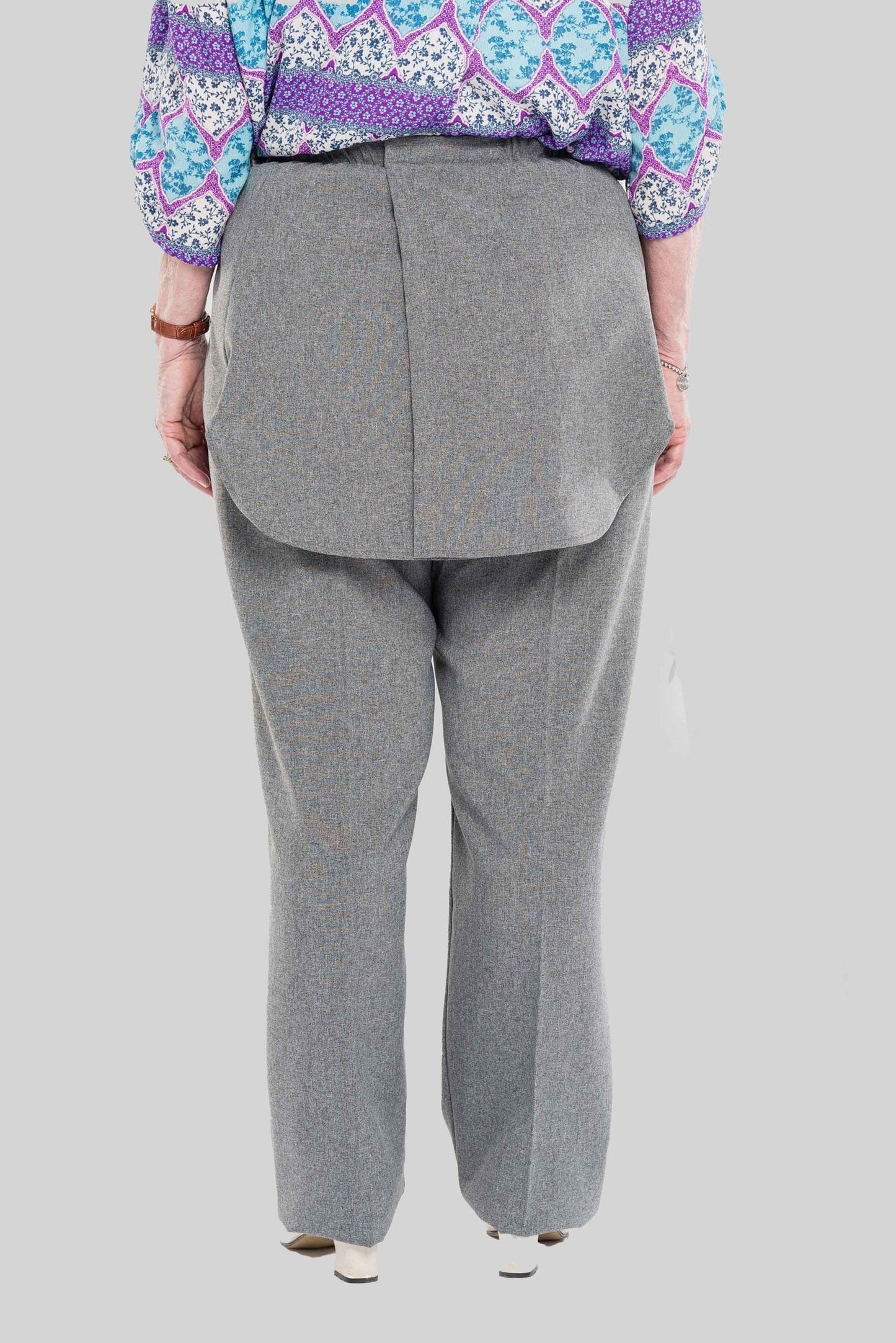 Stay comfortable and discreet with our adaptive pants. Designed with a back opening and double panels to conceal incontinence undergarments, these pants offer an attractive heathered tone and are our best seller. Easy metal snaps make dressing a breeze. P