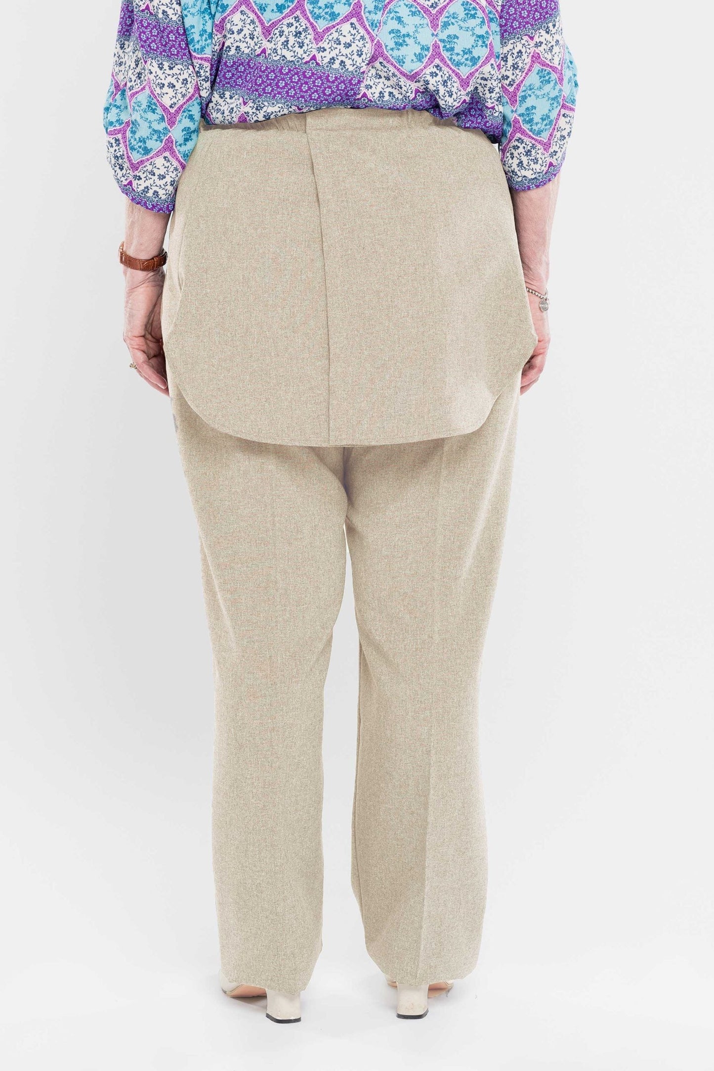 Stay comfortable and discreet with our adaptive pants. Designed with a back opening and double panels to conceal incontinence undergarments, these pants offer an attractive heathered tone and are our best seller. Easy metal snaps make dressing a breeze. P