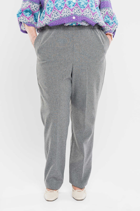 Stay comfortable and stylish with our adaptive pants. Designed for women, our pants feature convenient side openings with snap closures. Made from machine-washable gabardine polyester, these pants also have an attractive heathered tone. Perfect for everyd